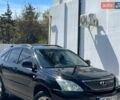 Черный Лексус РХ, объемом двигателя 3 л и пробегом 211 тыс. км за 7699 $, фото 1 на Automoto.ua