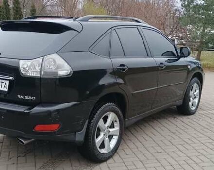 Черный Лексус РХ, объемом двигателя 3.31 л и пробегом 296 тыс. км за 8900 $, фото 4 на Automoto.ua