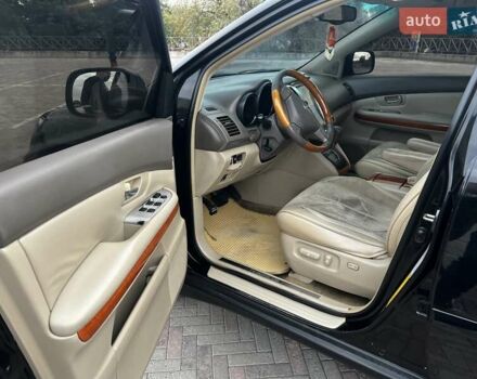 Черный Лексус РХ, объемом двигателя 3.3 л и пробегом 279 тыс. км за 9700 $, фото 1 на Automoto.ua