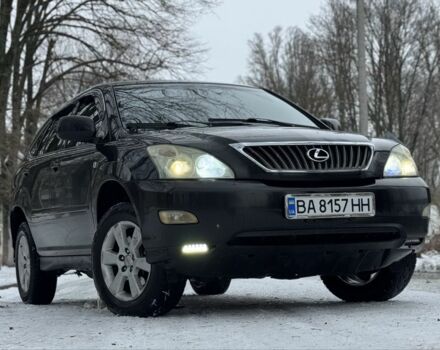 Черный Лексус РХ, объемом двигателя 2.4 л и пробегом 287 тыс. км за 6350 $, фото 2 на Automoto.ua