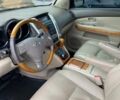 Черный Лексус РХ, объемом двигателя 3.31 л и пробегом 280 тыс. км за 7500 $, фото 1 на Automoto.ua