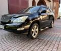 Черный Лексус РХ, объемом двигателя 3.3 л и пробегом 290 тыс. км за 10424 $, фото 1 на Automoto.ua