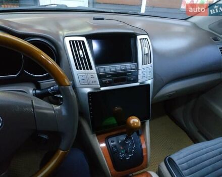 Черный Лексус РХ, объемом двигателя 3 л и пробегом 325 тыс. км за 8500 $, фото 4 на Automoto.ua