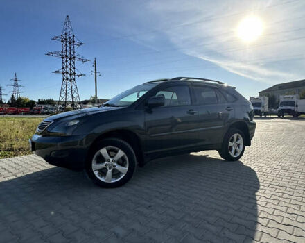 Черный Лексус РХ, объемом двигателя 3.3 л и пробегом 225 тыс. км за 10500 $, фото 1 на Automoto.ua