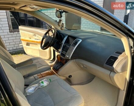 Черный Лексус РХ, объемом двигателя 3.3 л и пробегом 230 тыс. км за 10000 $, фото 12 на Automoto.ua