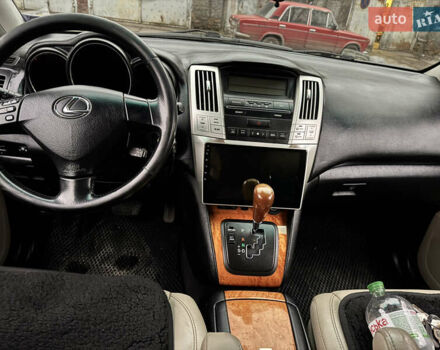 Черный Лексус РХ, объемом двигателя 3 л и пробегом 267 тыс. км за 8400 $, фото 4 на Automoto.ua
