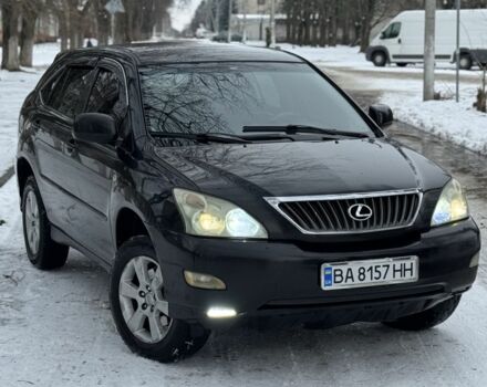 Черный Лексус РХ, объемом двигателя 2.4 л и пробегом 287 тыс. км за 6350 $, фото 3 на Automoto.ua