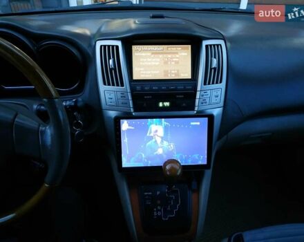 Черный Лексус РХ, объемом двигателя 3 л и пробегом 325 тыс. км за 8500 $, фото 3 на Automoto.ua