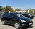 Черный Лексус РХ, объемом двигателя 3 л и пробегом 380 тыс. км за 9403 $, фото 1 на Automoto.ua