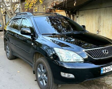 Черный Лексус РХ, объемом двигателя 3 л и пробегом 277 тыс. км за 9800 $, фото 1 на Automoto.ua