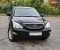 Черный Лексус РХ, объемом двигателя 3.46 л и пробегом 258 тыс. км за 9700 $, фото 1 на Automoto.ua