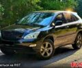 Черный Лексус РХ, объемом двигателя 3 л и пробегом 249 тыс. км за 11200 $, фото 1 на Automoto.ua
