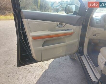 Черный Лексус РХ, объемом двигателя 3 л и пробегом 265 тыс. км за 6100 $, фото 31 на Automoto.ua