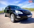 Черный Лексус РХ, объемом двигателя 3.46 л и пробегом 250 тыс. км за 11000 $, фото 4 на Automoto.ua