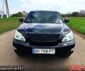 Черный Лексус РХ, объемом двигателя 3.5 л и пробегом 245 тыс. км за 10500 $, фото 1 на Automoto.ua