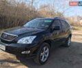 Черный Лексус РХ, объемом двигателя 3.46 л и пробегом 330 тыс. км за 9000 $, фото 1 на Automoto.ua