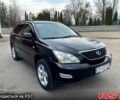 Черный Лексус РХ, объемом двигателя 3.5 л и пробегом 250 тыс. км за 9800 $, фото 1 на Automoto.ua