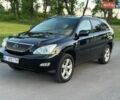 Черный Лексус РХ, объемом двигателя 3.5 л и пробегом 262 тыс. км за 10800 $, фото 1 на Automoto.ua