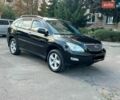 Черный Лексус РХ, объемом двигателя 3.46 л и пробегом 320 тыс. км за 8900 $, фото 1 на Automoto.ua
