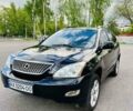 Черный Лексус РХ, объемом двигателя 3.46 л и пробегом 350 тыс. км за 9799 $, фото 1 на Automoto.ua