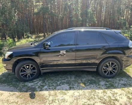 Черный Лексус РХ, объемом двигателя 3.3 л и пробегом 300 тыс. км за 11203 $, фото 1 на Automoto.ua