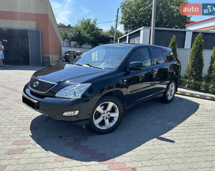 Черный Лексус РХ, объемом двигателя 3.5 л и пробегом 317 тыс. км за 11500 $, фото 1 на Automoto.ua