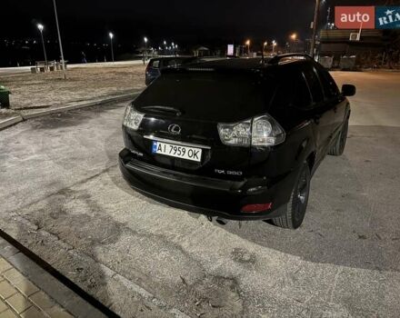 Черный Лексус РХ, объемом двигателя 3.5 л и пробегом 270 тыс. км за 10000 $, фото 1 на Automoto.ua