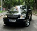 Черный Лексус РХ, объемом двигателя 3.5 л и пробегом 270 тыс. км за 11200 $, фото 1 на Automoto.ua