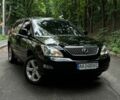 Черный Лексус РХ, объемом двигателя 3.5 л и пробегом 270 тыс. км за 11200 $, фото 1 на Automoto.ua