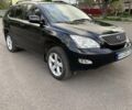Черный Лексус РХ, объемом двигателя 3.46 л и пробегом 350 тыс. км за 9799 $, фото 1 на Automoto.ua