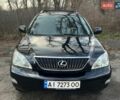 Черный Лексус РХ, объемом двигателя 3.46 л и пробегом 240 тыс. км за 11700 $, фото 1 на Automoto.ua