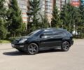 Черный Лексус РХ, объемом двигателя 3.5 л и пробегом 243 тыс. км за 10999 $, фото 1 на Automoto.ua
