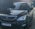 Черный Лексус РХ, объемом двигателя 3.5 л и пробегом 240 тыс. км за 12000 $, фото 1 на Automoto.ua