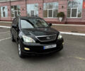 Черный Лексус РХ, объемом двигателя 3.5 л и пробегом 200 тыс. км за 11400 $, фото 1 на Automoto.ua