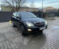 Черный Лексус РХ, объемом двигателя 3.5 л и пробегом 245 тыс. км за 9500 $, фото 1 на Automoto.ua