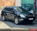 Черный Лексус РХ, объемом двигателя 3.5 л и пробегом 200 тыс. км за 11950 $, фото 1 на Automoto.ua