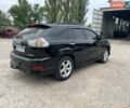 Черный Лексус РХ, объемом двигателя 3.46 л и пробегом 137 тыс. км за 11500 $, фото 4 на Automoto.ua