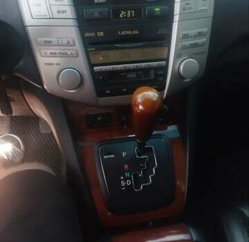Чорний Лексус РХ, об'ємом двигуна 3.46 л та пробігом 262 тис. км за 15000 $, фото 13 на Automoto.ua
