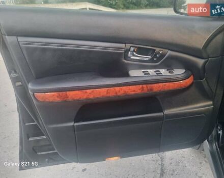 Черный Лексус РХ, объемом двигателя 3.46 л и пробегом 212 тыс. км за 10600 $, фото 3 на Automoto.ua