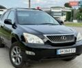 Чорний Лексус РХ, об'ємом двигуна 3.46 л та пробігом 235 тис. км за 10900 $, фото 1 на Automoto.ua
