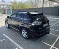 Черный Лексус РХ, объемом двигателя 3.5 л и пробегом 137 тыс. км за 12700 $, фото 1 на Automoto.ua