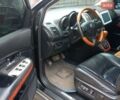 Черный Лексус РХ, объемом двигателя 3.46 л и пробегом 320 тыс. км за 8850 $, фото 1 на Automoto.ua