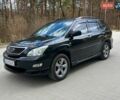 Черный Лексус РХ, объемом двигателя 3.5 л и пробегом 260 тыс. км за 12500 $, фото 1 на Automoto.ua