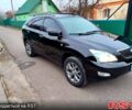 Черный Лексус РХ, объемом двигателя 3.5 л и пробегом 212 тыс. км за 11300 $, фото 1 на Automoto.ua