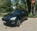 Черный Лексус РХ, объемом двигателя 3.5 л и пробегом 204 тыс. км за 12500 $, фото 1 на Automoto.ua