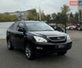 Черный Лексус РХ, объемом двигателя 3.5 л и пробегом 248 тыс. км за 10800 $, фото 1 на Automoto.ua