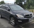 Черный Лексус РХ, объемом двигателя 3.5 л и пробегом 206 тыс. км за 11500 $, фото 1 на Automoto.ua