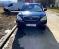 Черный Лексус РХ, объемом двигателя 3.5 л и пробегом 248 тыс. км за 12500 $, фото 1 на Automoto.ua