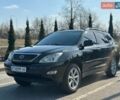 Черный Лексус РХ, объемом двигателя 3.46 л и пробегом 225 тыс. км за 12500 $, фото 1 на Automoto.ua