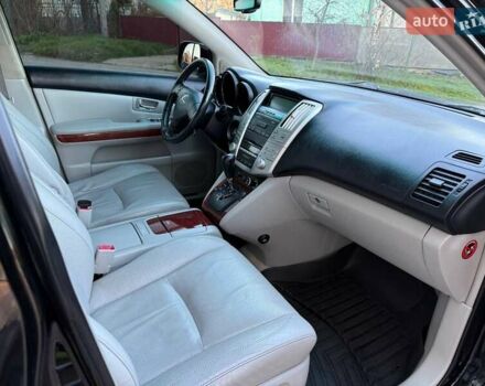 Черный Лексус РХ, объемом двигателя 3.46 л и пробегом 190 тыс. км за 12500 $, фото 65 на Automoto.ua